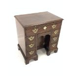 George III mahogany kneehole desk, brushing slide over one long drawer, one concealed drawer, one ar