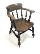 19th century stained elm and ash smokers bow armchair, with swept arms raised on spindle gallery, sa