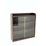 Phoenix Galleries 'Criterion' stained oak bookcase, with sliding glass doors enclosing two shelves,