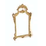 Gilt framed upright wall mirror, with scrolled floral and shell decoration to frame, 61cm x 110cm