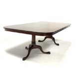 Late 20th century well figured mahogany twin pedestal dining table, the top raised on ring turned pe