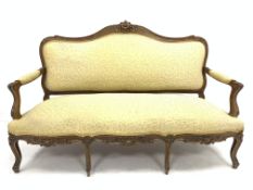 Victorian French style walnut canape, with gilt floral carved cresting rail over scrolled and acanth