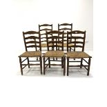 Set of five (2+3) oak ladderback dining chairs, with rush seats, raised on turned supports and stret