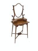 Edwardian inlaid mahogany dressing table, shield form angle poised mirror over three drawers, raised