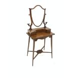 Edwardian inlaid mahogany dressing table, shield form angle poised mirror over three drawers, raised