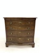 Georgian style walnut serpentine fronted chest, with brushing slide over four graduated drawers encl