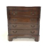 Early 20th century walnut chest, with brushing slide over four drawers, canted corners with applied