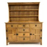 'Acornman' Yorkshire oak dresser, with two height plate rack over five drawers and two panelled cupb