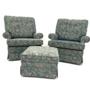 Parker Knoll - Pair of armchairs upholstered in blue floral fabric, and raised on castors, W87cm wit