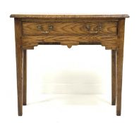 18th century style oak side table, with single drawer over shaped apron, raised on square tapered su