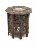 Indian hardwood octagonal occasional table, with brass inlaid top and incised elephants and interlac