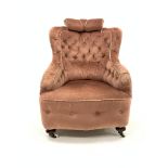 Victorian sprung back armchair, upholstered in buttoned pink velvet, raised on turned mahogany suppo