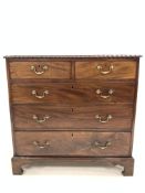 Early 19th century mahogany chest of drawers, with gadroon moulded edge over two short and three lon