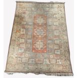 Vintage Turkish ground rug, three medallions on orange field, enclosed by geometric designs to multi