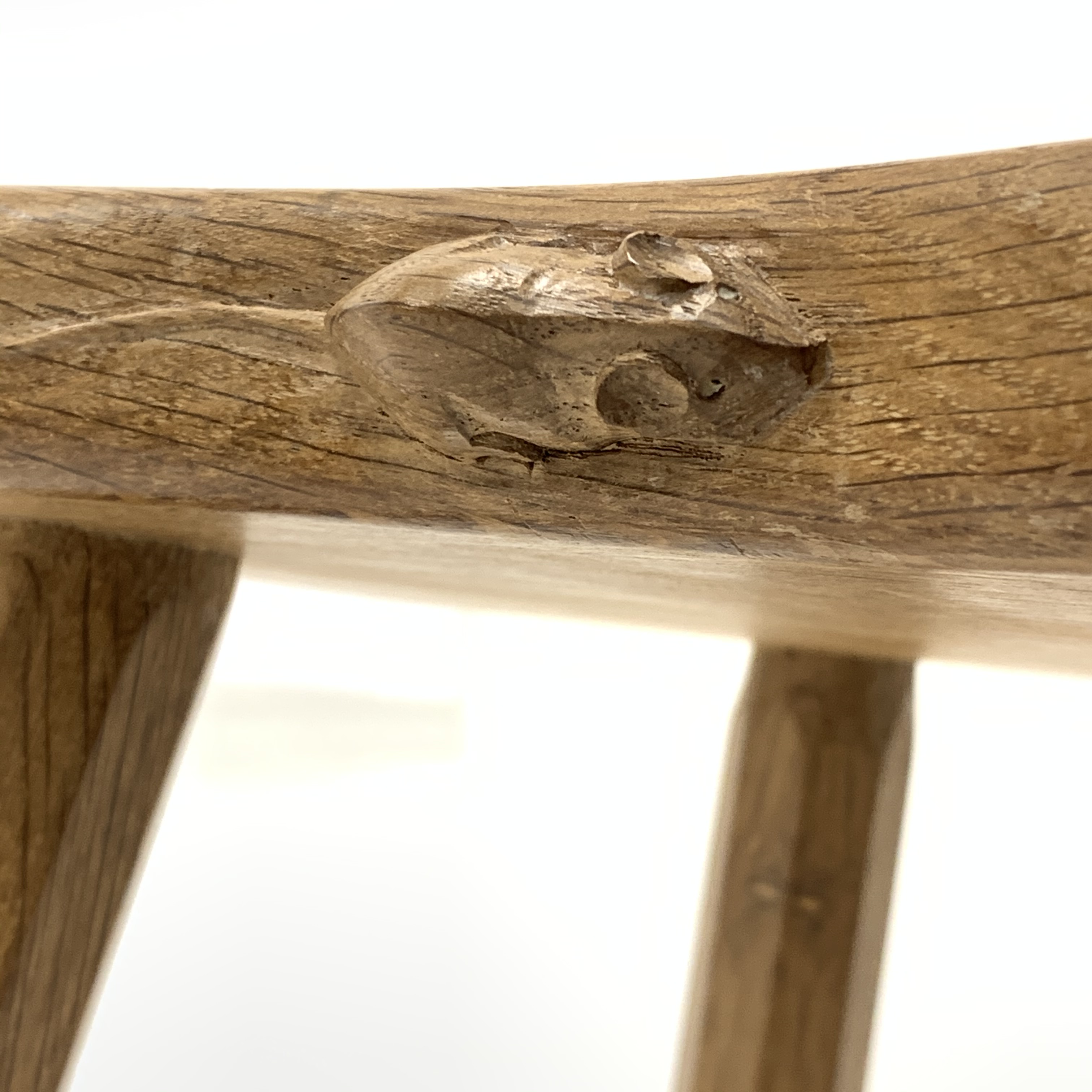 'Mouseman' Yorkshire oak four leg stool, with adzed saddle seat raised on octagonal tapered supports - Image 4 of 4