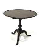 Georgian mahogany tilt top table, circular top with raised edge over bird bracket and snap top actio