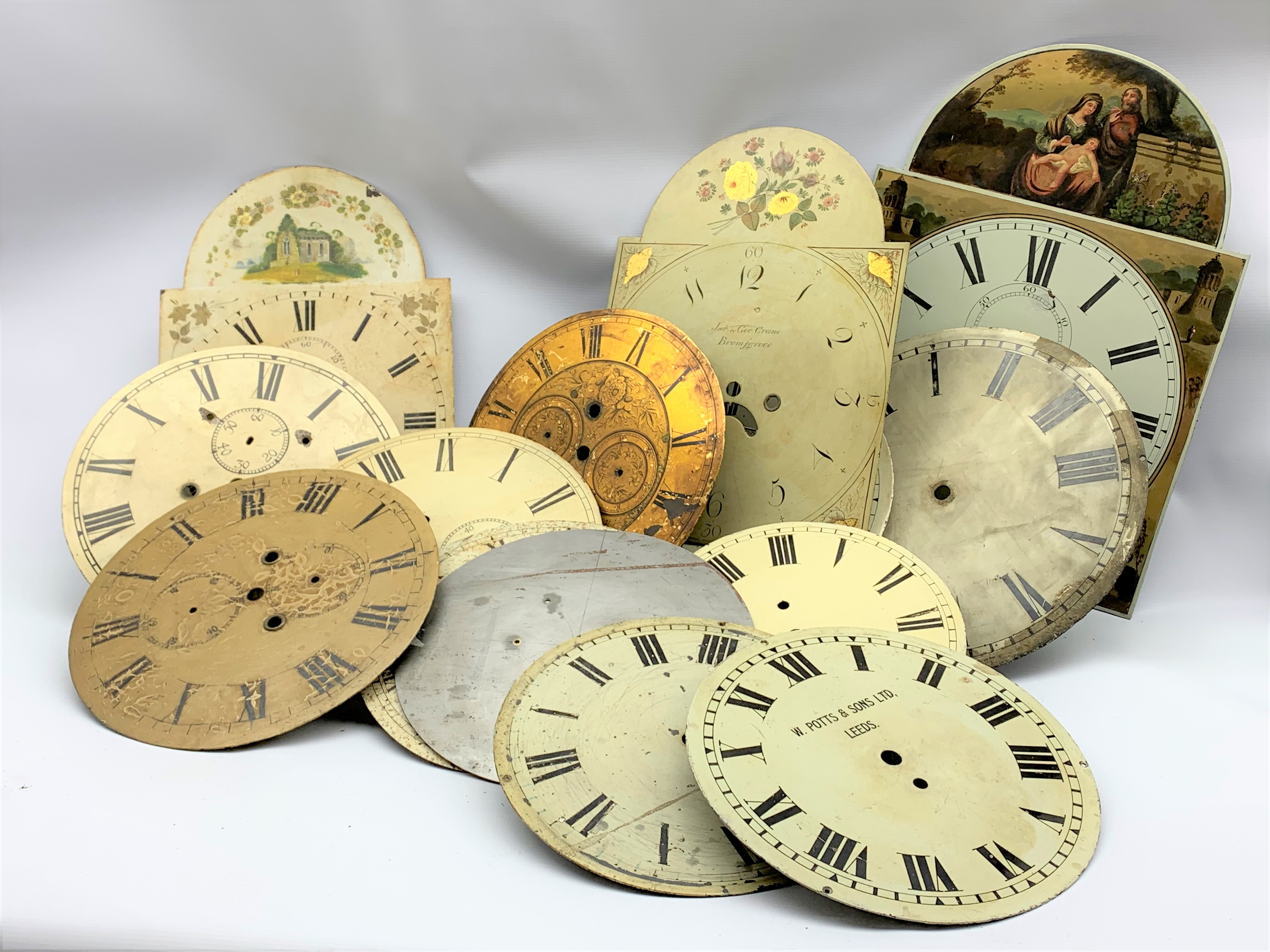 Various clock dials, manly white painted enamel, (15) and some longcase movement seat boards,