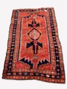 Persian Hamadan ground rug, pole medallion on red field with geometric decoration, enclosed by multi