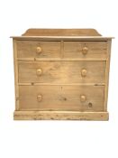 Early 20th century and later pine chest fitted with two short and two long graduated drawers, raised