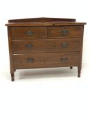 Edwardian walnut chest, with raised back over two short and two long drawers, raised on turned suppo