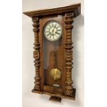 Walnut and beech cased Vienna style wall clock, with white dial with Roman chapter ring, twin train