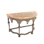 Victorian walnut demi lune console table, well figured top over Gothic arched apron, raised on turne