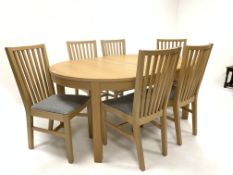 Ikea - Light oak oval extending dining table, with one fold away additional leaf (166cm x 115cm, H74