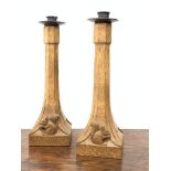 Pair 'Squirrelman' Yorkshire oak candlesticks of tapered octagonal form with square bases and caved