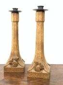 Pair 'Squirrelman' Yorkshire oak candlesticks of tapered octagonal form with square bases and caved