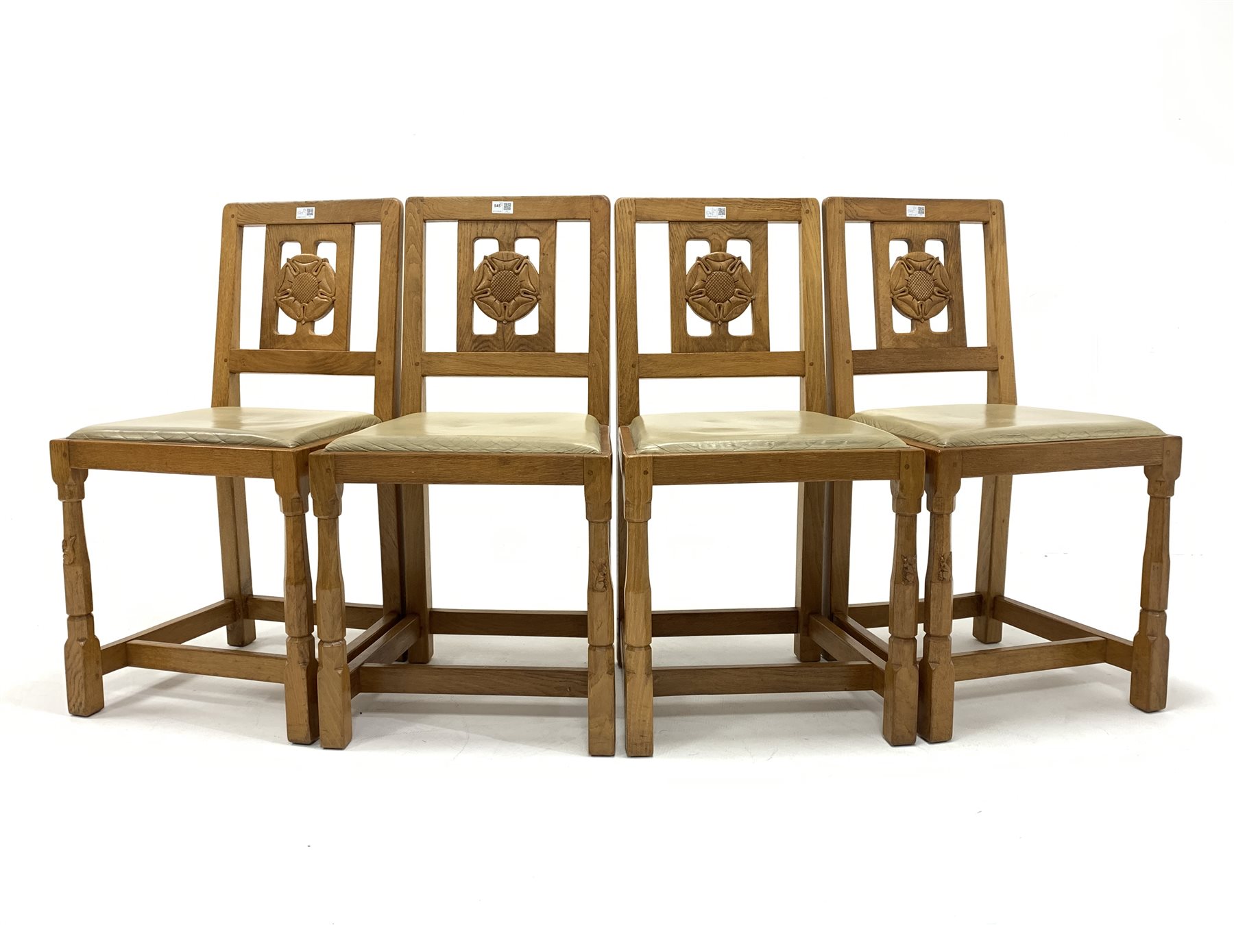 Set four 'Squirrelman' Yorkshire oak dining chairs, Yorkshire rose carved back panel over leather up