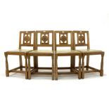 Set four 'Squirrelman' Yorkshire oak dining chairs, Yorkshire rose carved back panel over leather up