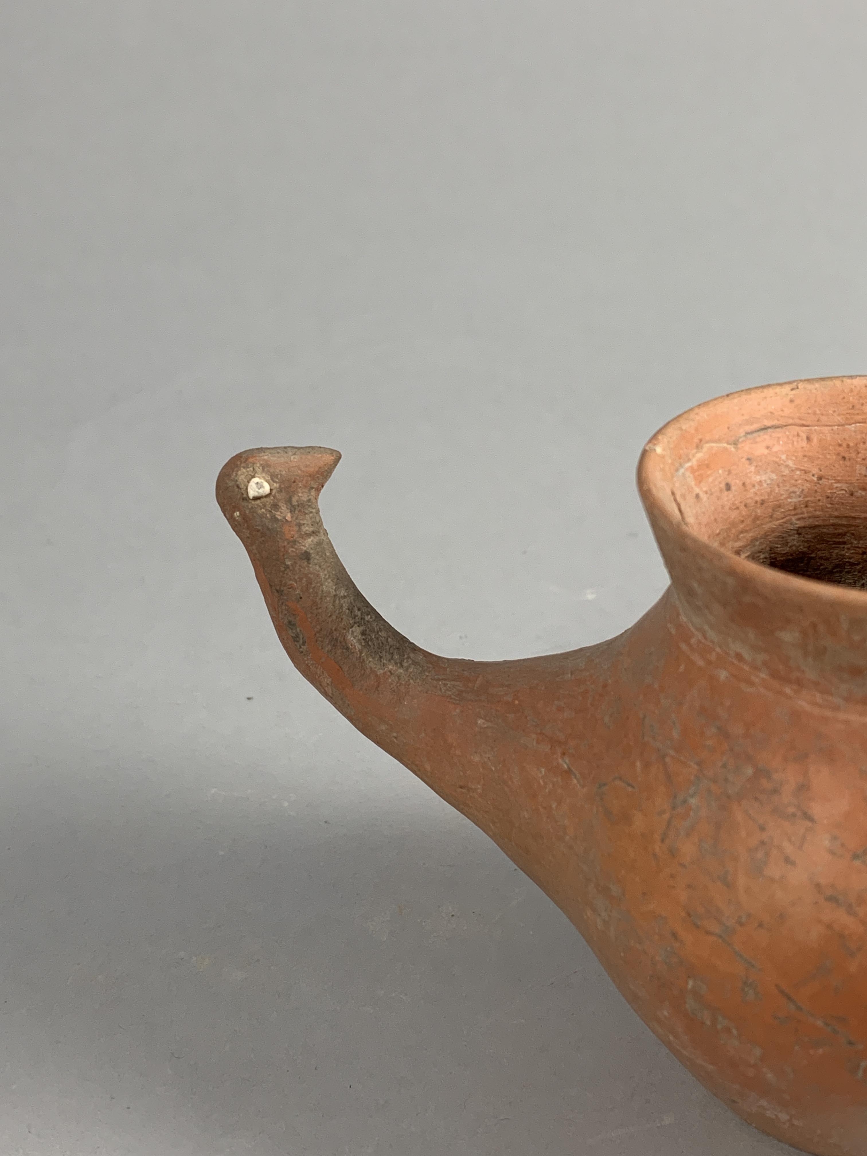 A Burnished Red Pottery Jar With A Bird-Head Handle, Gansu Province, Qijia Culture (2050-1700 Bc) - Image 10 of 10