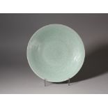 A Celadon Glazed 'Floral' Plate, Qinglong Period, Qing Dynasty