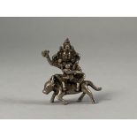 A Silver Figure of Bodhisattva Riding a Bull, c. 1800