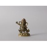 A Gilt-Bronze Figure of Guardian King with Vajra, Tibet, c. 1800