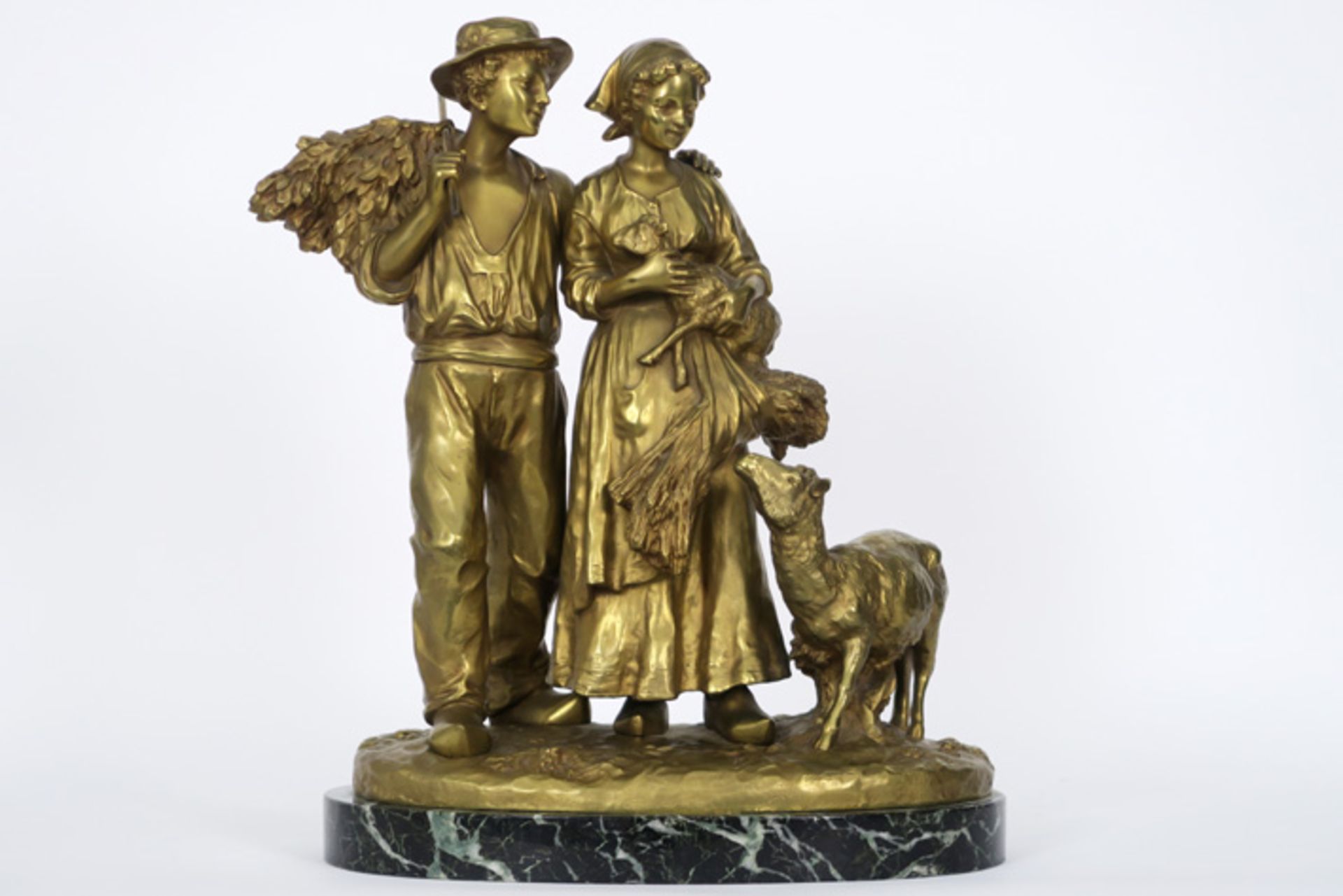 D'ASTE JOSEPH (1881 - 1945) sculptuur in gedoreerde brons : "Herder en herderin met [...]