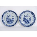 pair of 18th Cent. Chinese dishes in porcelain with blue-white decor with flower bush [...]