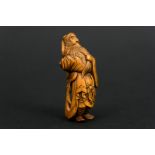 antique late Edo period finely cut wooden netsuke with the representation of "Kan'U" [...]