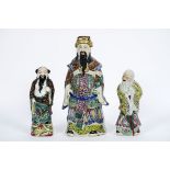 three Chinese "Sage" sculptures in porcelain with polychrome decor - - Lot van [...]