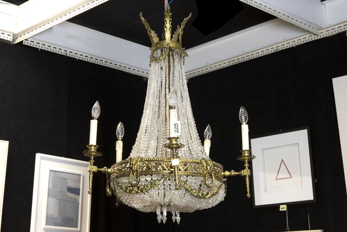 antique neoclassical chandelier in guilded bronze (with ram's heads) and crystal - [...]