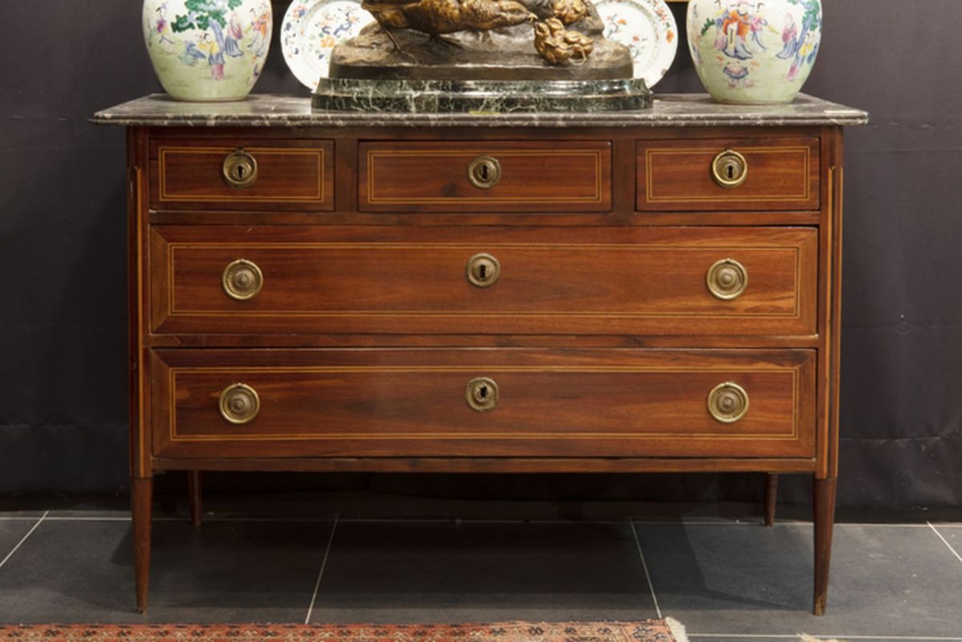 18th Cent. Louis XVI style chest of drawers mahogany with inlay - with five drawers [...]