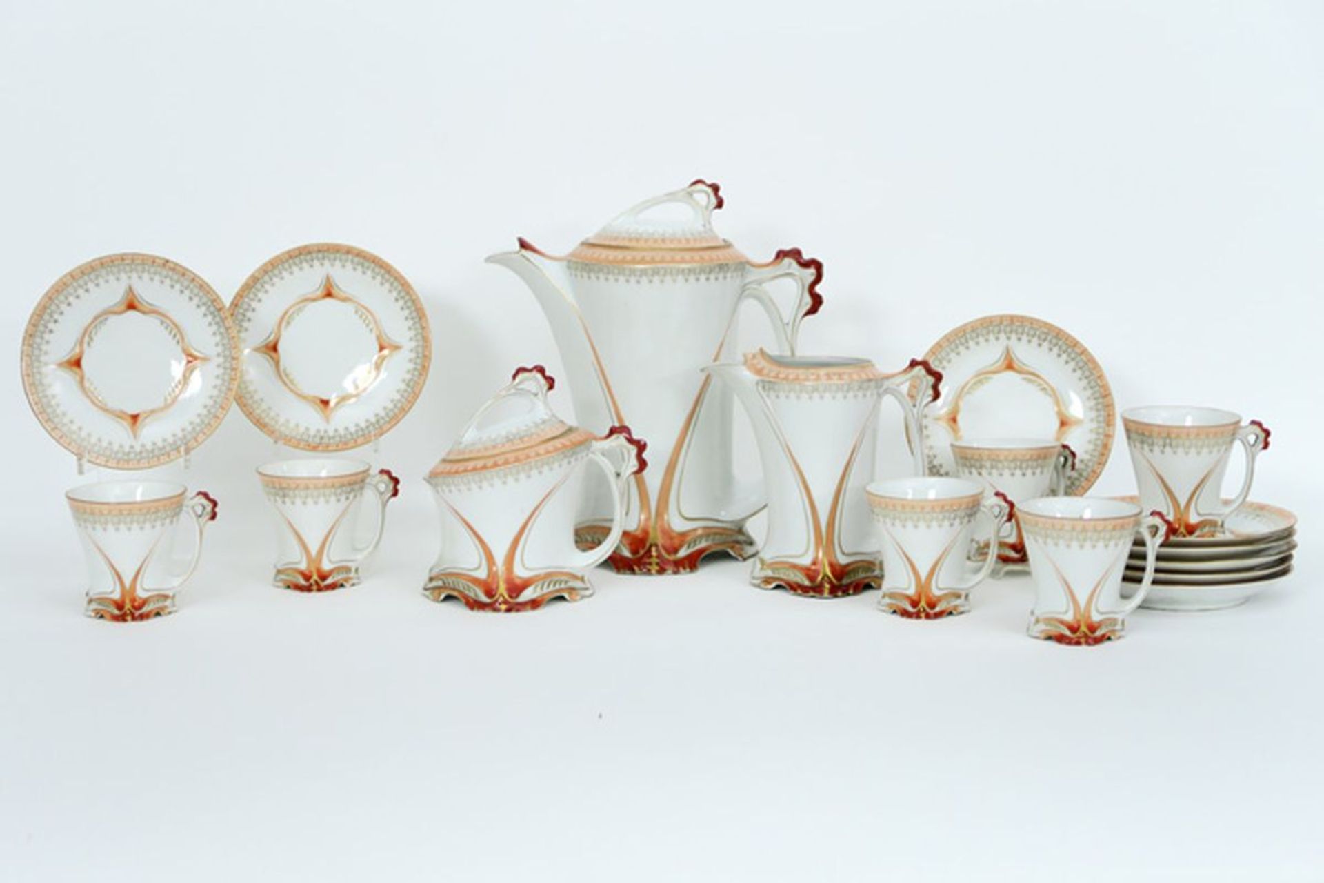 Art Nouveau coffeeset (17 pcs) in porcelain with polychromed whiplash ornamentation [...]