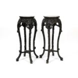 pair of antique Chinese pedestals in finely carved wood and with a marble top - - [...]