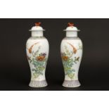pair of Chinese lidded vases in marked porcelain with polychrome decor - - Paar [...]