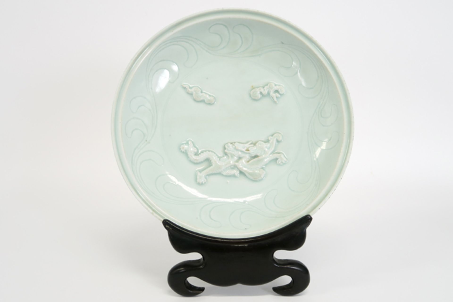 antique Chinese dish in marked celadon porcelain with a dragon's decor - with a nice [...]