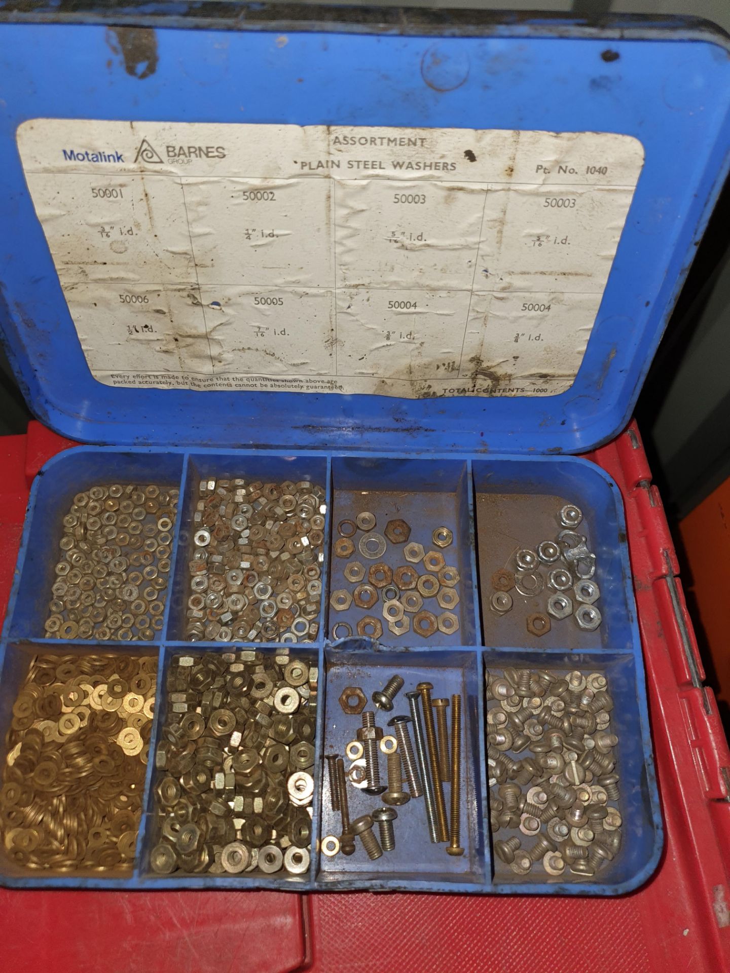 CONTAINER OF SMALL NUTS AND BOLTS