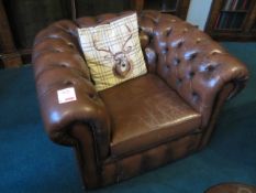 Brown leather effect single seater arm chair. Please ensure sufficient resource / handling aids