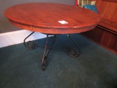 Darkwood oval table with metal design legs, approx. dia: 1200mm