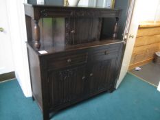 Darkwood triple door and twin drawer sideboard, 1250mm x 470mm. Please ensure sufficient