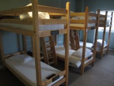 Triple joining timber frame bunk bed with dual stepped ladder access and joins (room Olwen). This